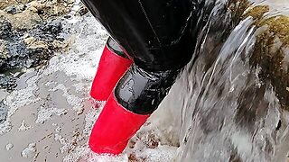 Red rubber boots and latex leggings