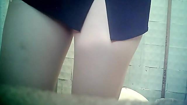 Cute babe in the voyeur pissing scene