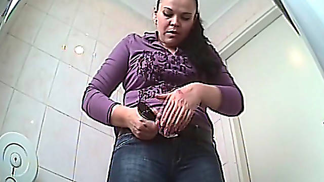 Hardcore babe is pissing on the hidden cam