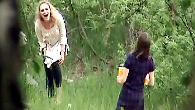 Pretty girl pissing in the woods