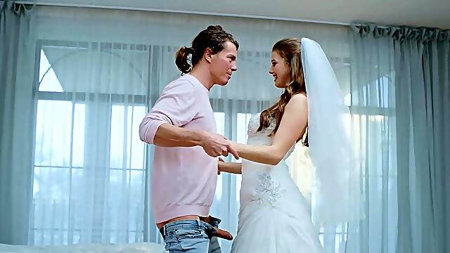 Olivia Sparkle in a wedding dress and veil caught on camera