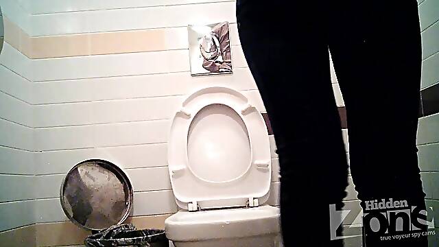 ?urly cutie showing her awesome ass in the toilet