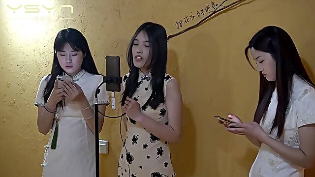 Three girls tied up singing