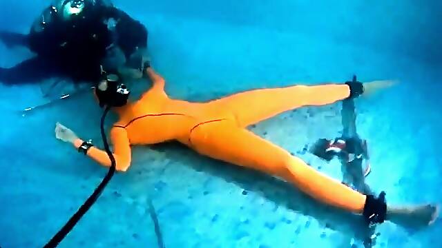 Kinky amateur lovers having some wild bondage fun underwater