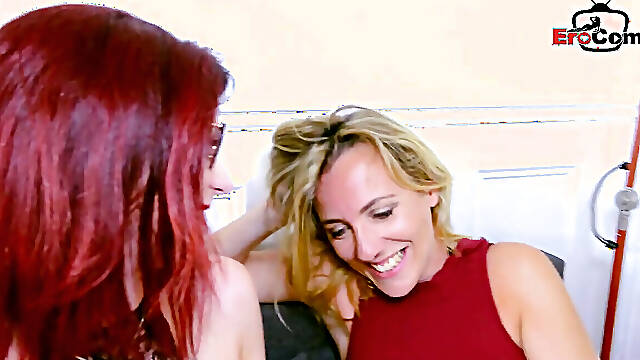 Sultry Redhead and Blonde Engage in Intense Lesbian Passion