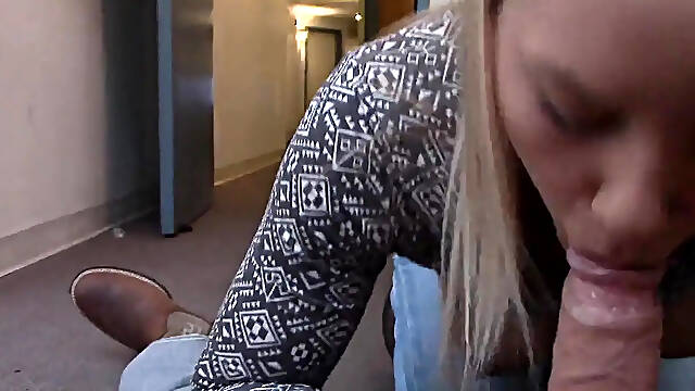 Cute teen 18 sucks cock in risky public hallway POV