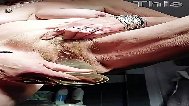 Hairy granny fucks her furry pussy with a big dildo