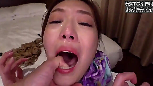 Japanese stewardess receives her toy in a naughty threesome