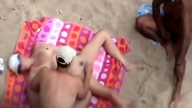 Sharing wife on the beach (with stranger)