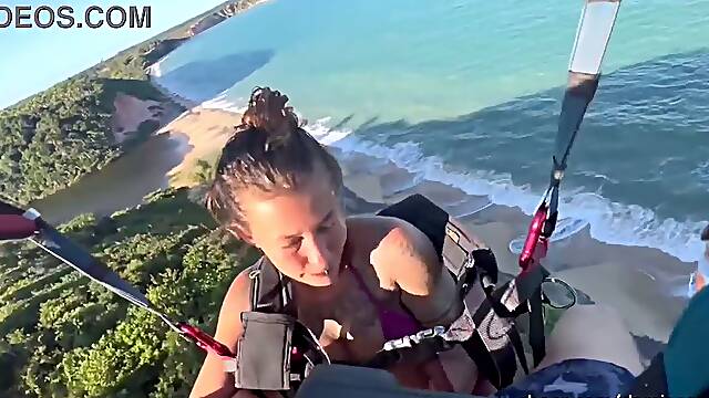 Sex at high altitudes: Having sex during a paragliding flight.