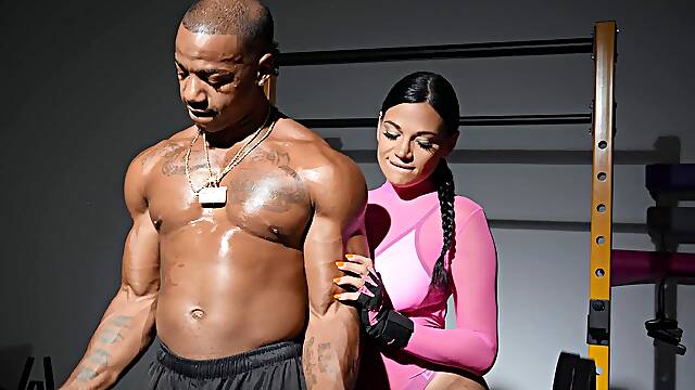 Naughty Mona Azar seduced a black guy and rides him in the gym