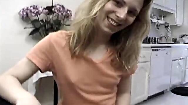 Blonde shemale Magnolia lets a guy play with her small cock