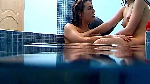 Underwater lesbian sex with a couple of teen hotties in the pool