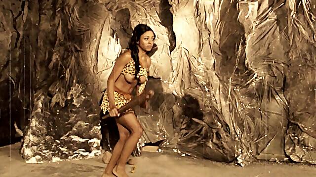 A guy fucks a hot girl who is dressed like she is from the stone age