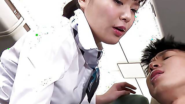 Japanese stewardess Haruka Miura blows a passenger hard cock uncensored.