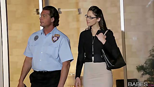 Office worker Anna Morna with glasses gets fucked by a security officer