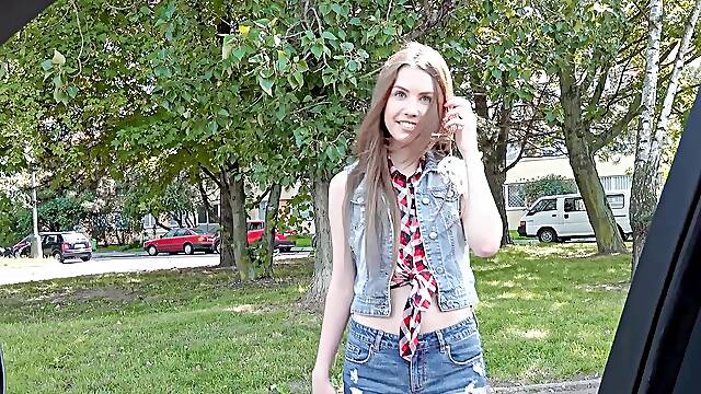 Skinny babe Elle seduces with her perky boobs and long locks in the great outdoors